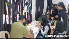 Members participating in caption writing competition